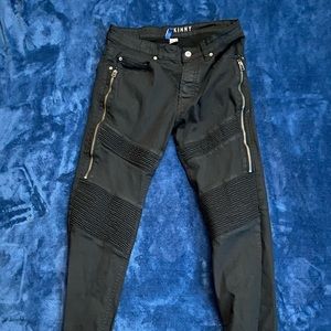 Riveted black skinny jeans